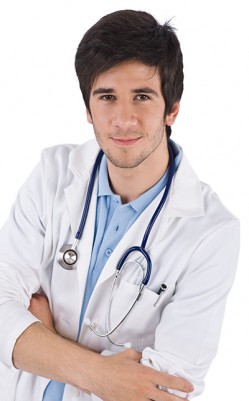 Young male doctor with arms crossed