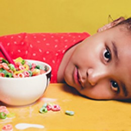 child with cereal